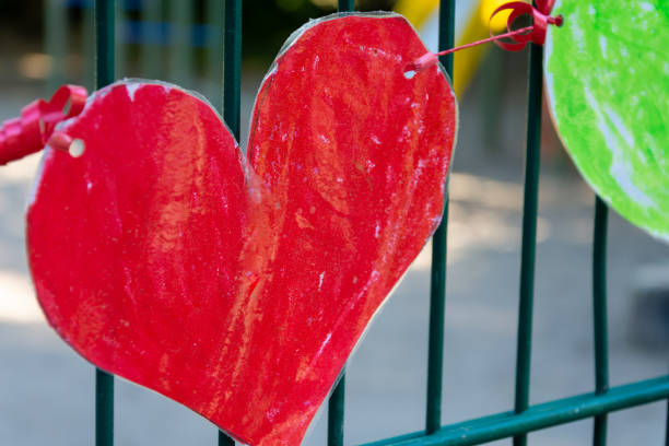 istock a red handmade heart made of cardboard 1400967313