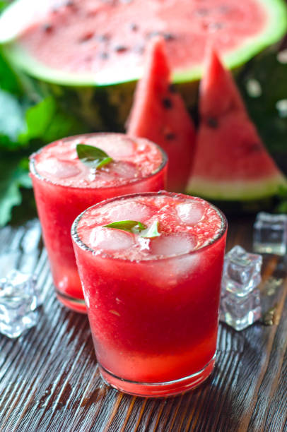 istock Fresh summer watermelon lemonade in glass glasses. 1400969294