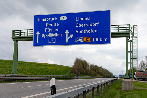 Kempten, Allgäu, Schwaben, Bavaria, Germany, may 1st 2022, daytime traffic on the German A7 Autobahn at the Allgäu interchange (half cloverstack type) near Kempten - with a length of 963 km between the borders of Denmark in the north and Austria in the south, the  Autobahn 7 is the longest Autobahn in Germany