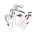 istock woman with red nails near the eyes 1400974509