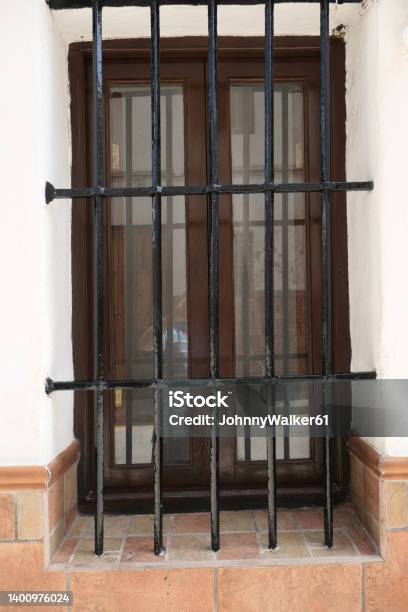 Wrought Iron Grill Or Bars On Window Stock Photo - Download Image Now - Andalusia, Architecture, Color Image