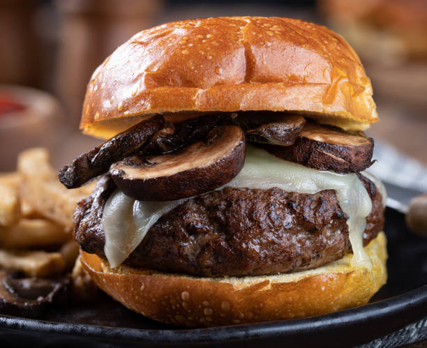 istock Mushroom cheeseburger on a toasted bun 1400980770