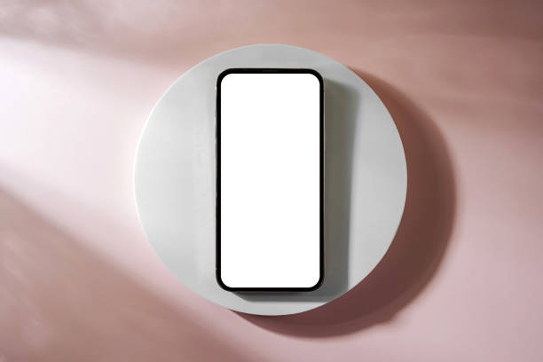 Smartphone with blank black screen. Mobile phone with a round geometric shape. Device screen mockup on minimal background for presentation or application design show.