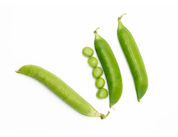 istock Fresh green pea isolated on white background with clipping path. 1400988111
