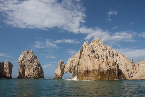 Natural rocky arch in Lovers beach, Cabo San Lucas, Baja California, Mexico