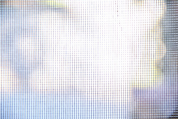 istock Old mesh mosquito wire screen texture with seamless patterns on garden background 1400989650