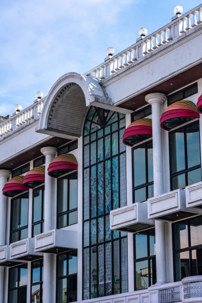 istock Beautiful white heritage building architecture under the clear and bright blue sky at Braga street Bandung 1400990636