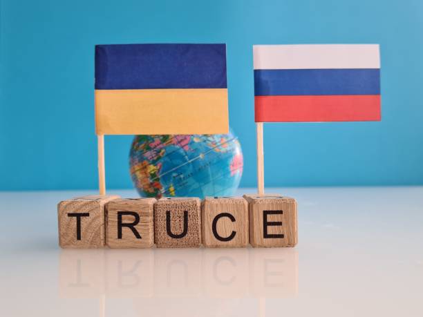 Truce Russia Ukraine military conflict and war Truce Russia Ukraine military conflict and war. Settlement agreement and end of war concept truce flag stock pictures, royalty-free photos & images