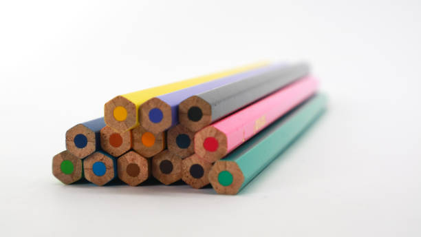 Different color pencils as background, closeup view