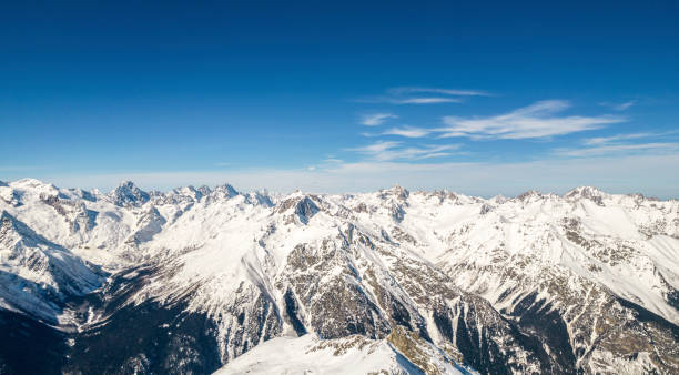 istock mountains in snow and sky with clouds 1400999651