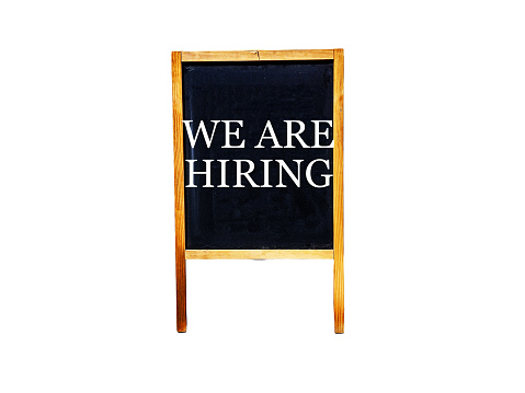 We are hiring text on a board with wooden frames