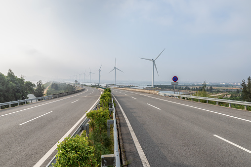 Empty highways and tidy wind turbines