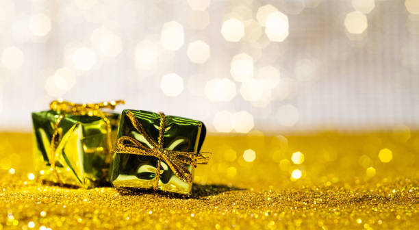istock Christmas gifts on shiny background 1401005559
