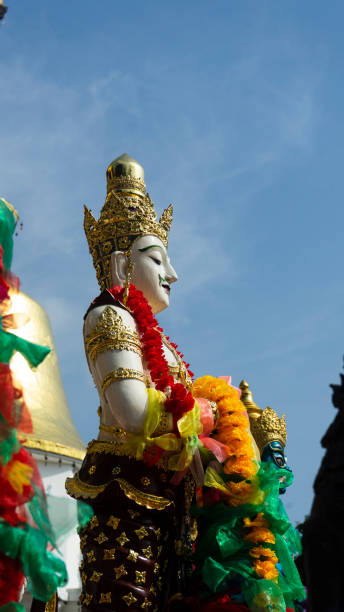 istock A white angel statue stands guarding the temple. 1401005799