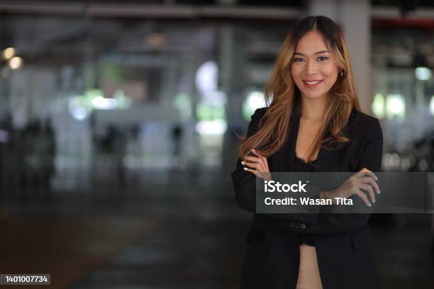 Portrait Of A Happy Charming Business Woman Looking At The Camera In The Office Stock Photo - Download Image Now