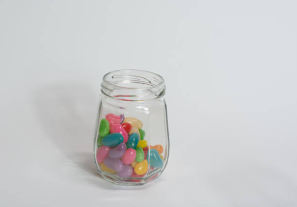 istock Glass jar with coloured candy for children 1401009947
