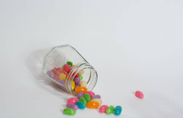 istock Glass jar with coloured candy for children 1401009951