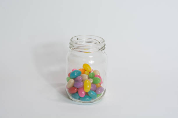 istock Glass jar with coloured candy for children 1401009961
