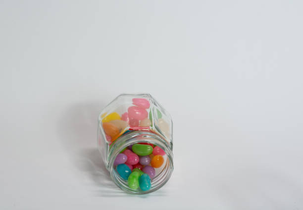 istock Glass jar with coloured candy for children 1401009967