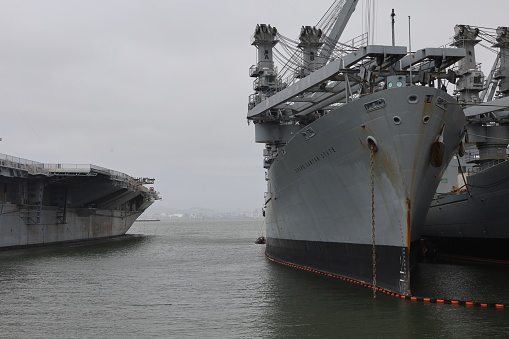 A Canadian Navy warship docked at pier.