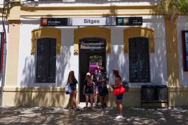 Sitges train station poster. Rodailes de Catalunya, Renfe. Lines R2 Sud and R15 stock photo