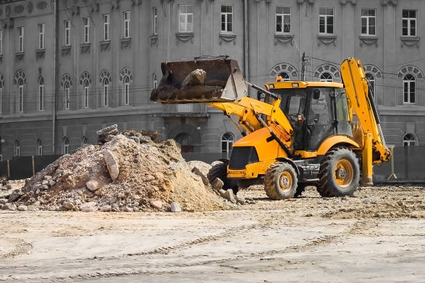 istock Special equipment for road repair. Road construction. Front and universal loaders. 1401020538
