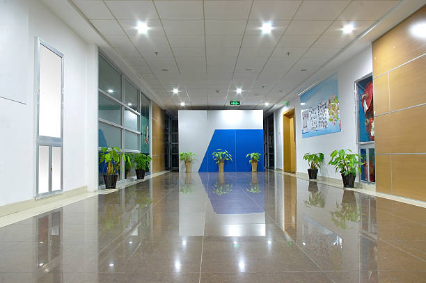 Large open office corridor with a shiny floor stock photo