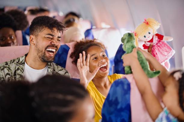 istock The sisters play with plush toys while traveling by plane 1401027236