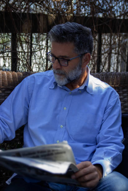 istock Senior bearded man relax outdoors 1401027632