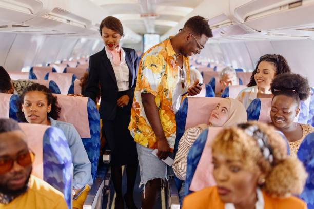 istock Young multiracial couple boarding the plane 1401029781