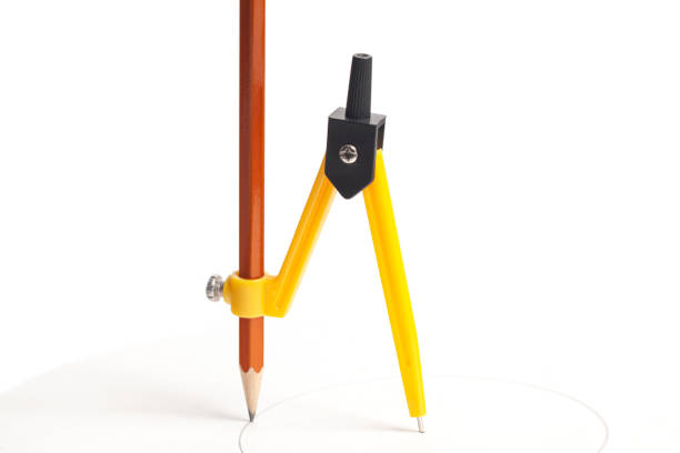 istock Yellow compass with pencil isolated on white background 1401031670