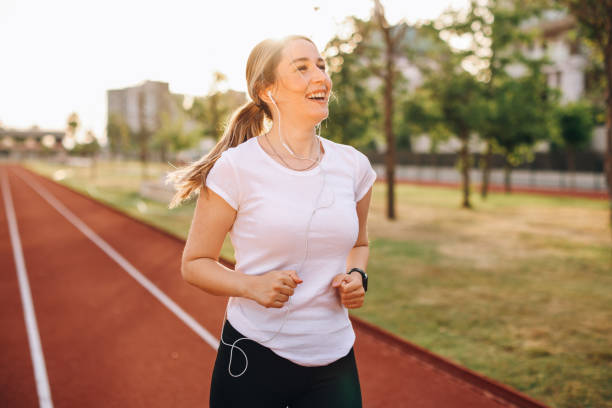 istock Woman running in urban environment 1401035745