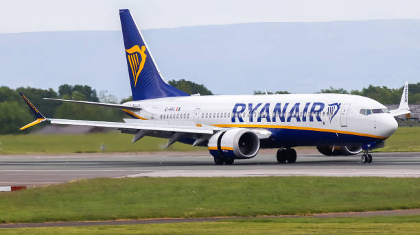 Ryanair Boeing 737 MAX at Manchester Airport. Manchester Airport, United Kingdom - 20 May, 2022: Ryanair Boeing 737 MAX (EI-HMX) arriving from Copenhagen, Denmark. 737 stock pictures, royalty-free photos & images