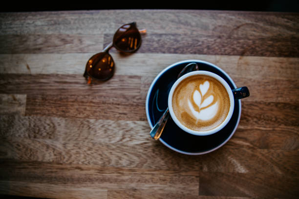 Delicious flat white coffee with latte art in a cup