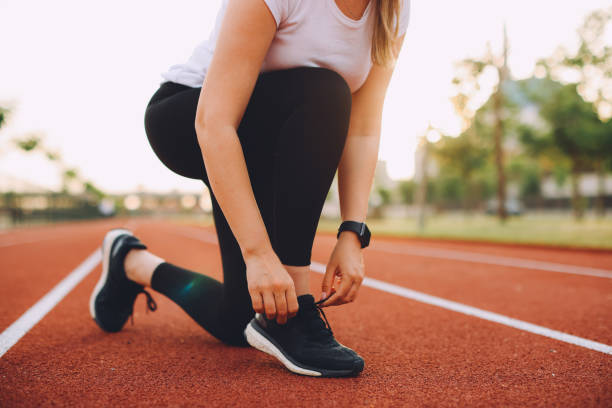 istock Woman running in urban environment 1401039304