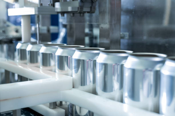 istock Automatic Filling line for drink cans. High quality photography 1401042304
