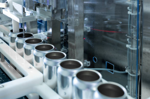 istock Automatic Filling line for drink cans. High quality photography 1401042332