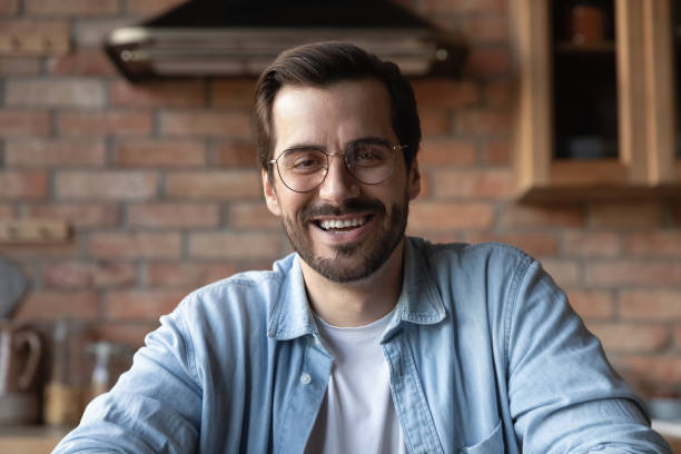 istock Head shot portrait smiling bearded man in glasses talking 1401047433