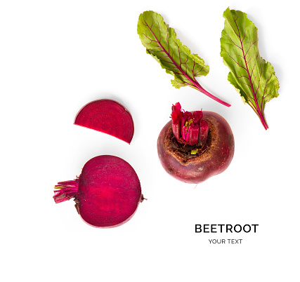 Creative layout made of beetroot. Flat lay. Food concept. Vegetables isolated on white background.