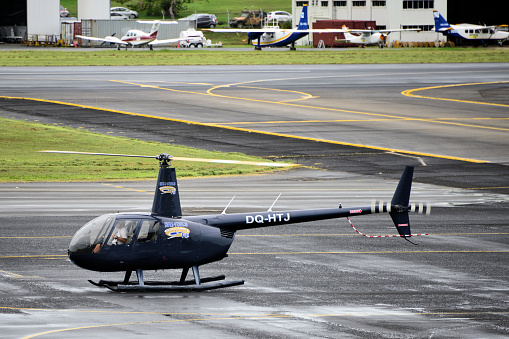Nadi, Viti Levu island, Fiji: DQ-HTJ - Robinson R44 Raven I, a four-seat, single-engine piston light helicopter, the world's best-selling general aviation helicopter - Nadi International Airport