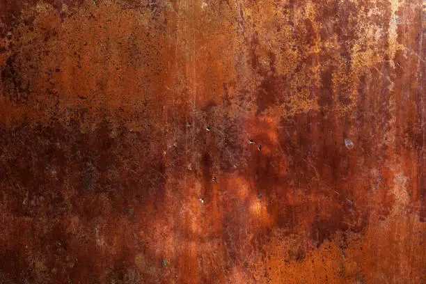 Photo of Orange Metal rusty background, Metal grunge texture. Copper plate texture, brushed orange metal surface