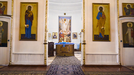 Corridor to Christian Church with icons. Stock footage. Symmetrical passage with beautiful icons to central hall of russian Church.