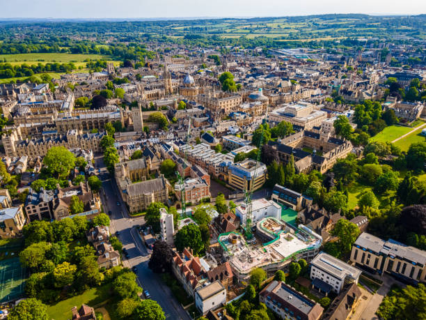The aerial view of Oxford city center in summer, UK The aerial view of Oxford city center in summer, UK oxford england stock pictures, royalty-free photos & images