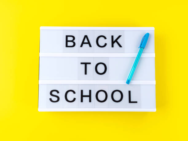 istock White lightbox with back to school text on yellow background 1401067044