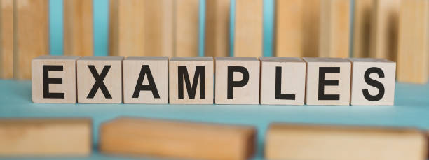 istock EXAMPLES word written on wooden blocks on light blue background. 1401067554