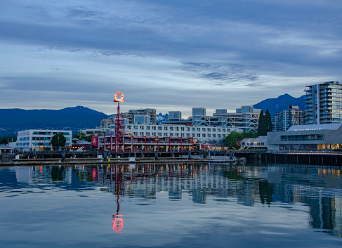 View of the Lonsdale Quay and mountains in the background from the Burrard Dry Dock, North Vancouver, BC