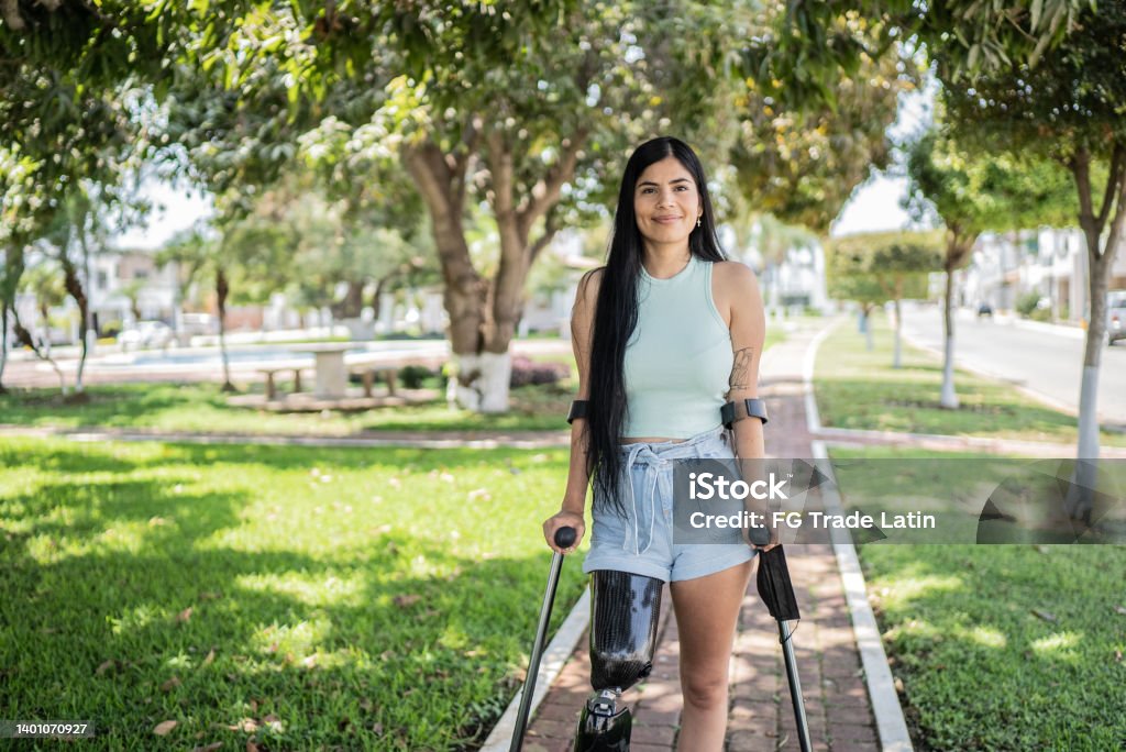 Portrait of a woman with leg prosthesis Disability Stock Photo