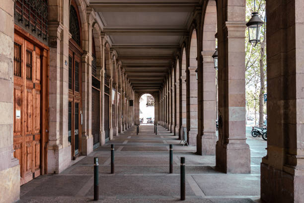 istock Hallway with geometric columns and diminishing perspective. Walkway arch style 1401072822