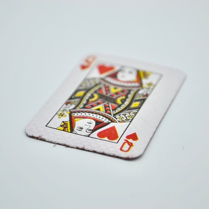 Roi, King of clubs. Over 100 years old, this small antique card (shown both front and back design) displays the Paris pattern as amended in around 1857. The card represents (but has no likeness to) Alexander The Great.
