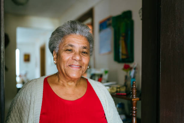 Smiling elderly woman at home